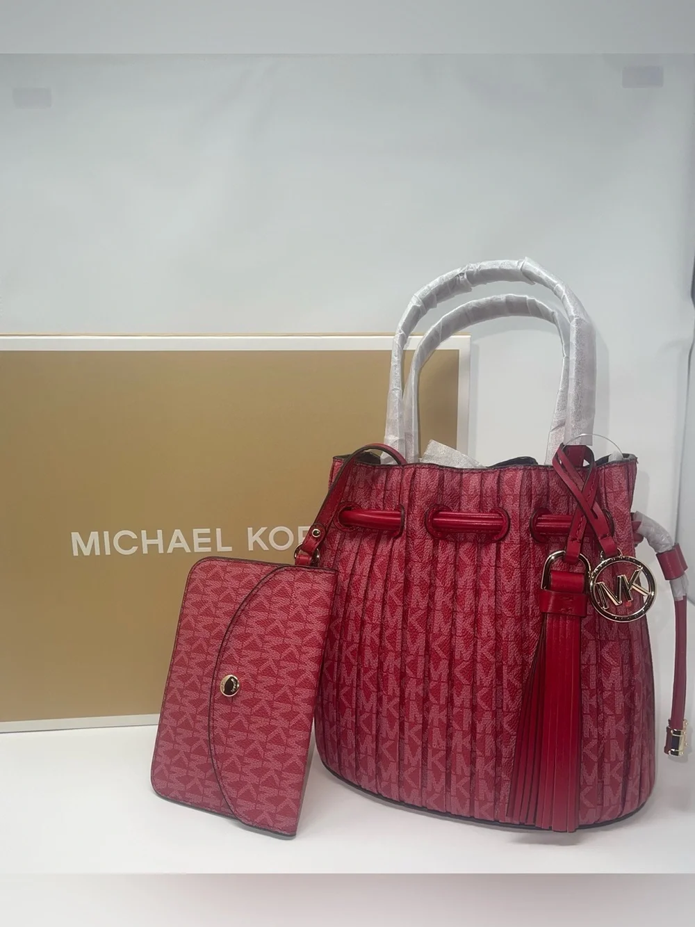 Michael Kors Red Signature Drawstring Tote with Tassel and Pouch